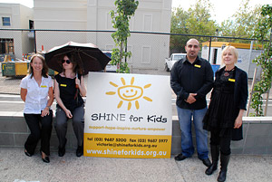 SHINE staff greet the attendees