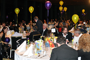 The tables were decorated in SHINE's colours of purple and yellow, with origami tablepieces